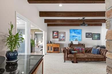 This 4-bedroom, 3-bath midcentury lake home offers 100 feet of - photo 24