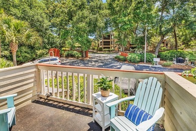Exceptional marsh-front views, a spacious two-story layout, and - photo 25