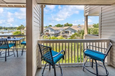 Exceptional marsh-front views, a spacious two-story layout, and - photo 26