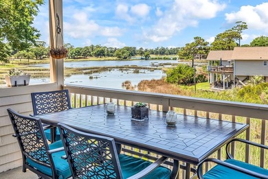 Exceptional marsh-front views, a spacious two-story layout, and - photo 28