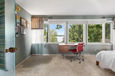 This 4-bedroom, 3-bath midcentury lake home offers 100 feet of - photo 29