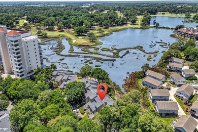 Exceptional marsh-front views, a spacious two-story layout, and - photo 33
