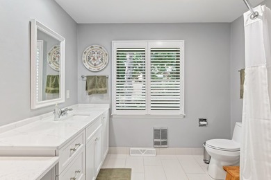 This 4-bedroom, 3-bath midcentury lake home offers 100 feet of - photo 33
