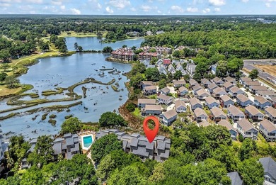 Exceptional marsh-front views, a spacious two-story layout, and - photo 34