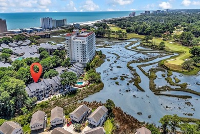 Exceptional marsh-front views, a spacious two-story layout, and - photo 35