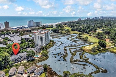 Exceptional marsh-front views, a spacious two-story layout, and - photo 36