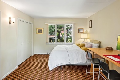 This 4-bedroom, 3-bath midcentury lake home offers 100 feet of - photo 38
