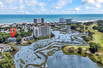 Exceptional marsh-front views, a spacious two-story layout, and - photo 39