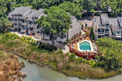 Exceptional marsh-front views, a spacious two-story layout, and - photo 41