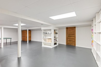 This 4-bedroom, 3-bath midcentury lake home offers 100 feet of - photo 41