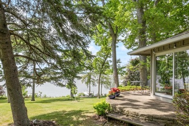 This 4-bedroom, 3-bath midcentury lake home offers 100 feet of - photo 48