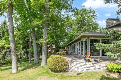 This 4-bedroom, 3-bath midcentury lake home offers 100 feet of - photo 49