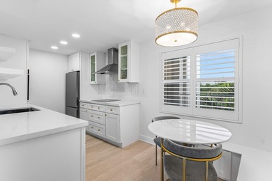 INTRACOASTAL VIEWS FULLY RENOVATED! Experience waterfront living - photo 2