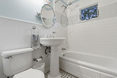 Welcome to this charming 4-bedroom, 2-bath home nestled in the - photo 11
