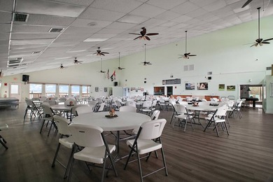 Nestled within the desirable Lake Griffin Habor, a vibrant - photo 19