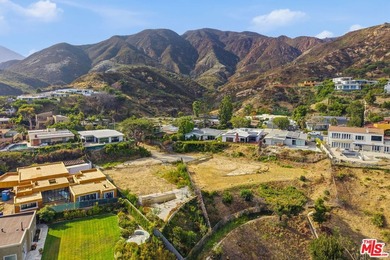 3442 Cloudcroft Dr, Malibu is uniquely positioned on a 15,278 - photo 9