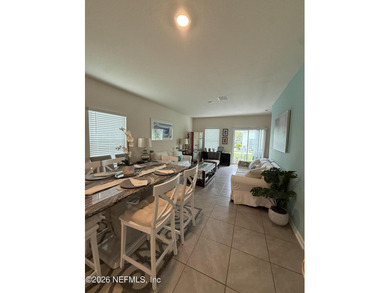 Welcome to this beautiful and nearly new townhome in the highly - photo 4