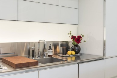 Designed by Foster + Partners and built by Bosa Properties, this - photo 12