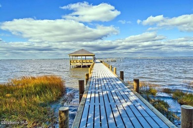 Welcome to coastal living at its finest in this beautifully