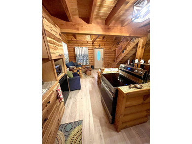 A true Abe Lincoln log home featuring 2 bedrooms, one up, one - photo 3