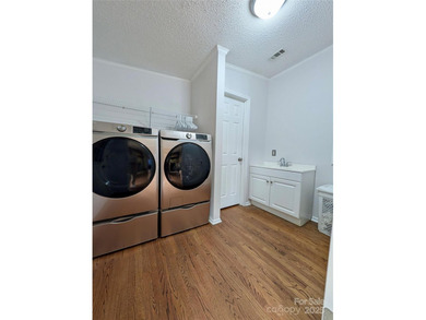Looking for a little extra space? This inviting 3BR/2BA home in - photo 12