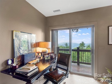 This home sits near the top of the mountain. Its recently - photo 40