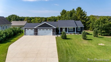 Hardy Dam Pond Home For Sale in Stanwood Michigan