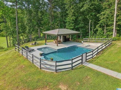 Experience resort-style living on beautiful acreage with the - photo 5
