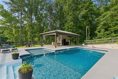 Experience resort-style living on beautiful acreage with the - photo 6