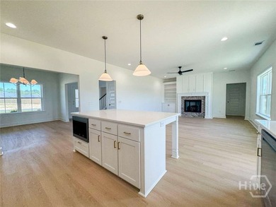 Two-story home featuring a main-floor primary suite on a - photo 8