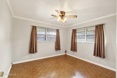 This well-maintained 3-bedroom brick home in Long Beach offers a - photo 19