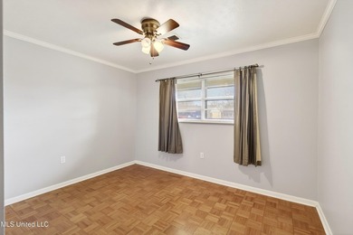 This well-maintained 3-bedroom brick home in Long Beach offers a - photo 20