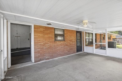 This well-maintained 3-bedroom brick home in Long Beach offers a - photo 27