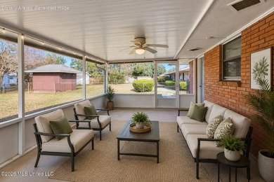 This well-maintained 3-bedroom brick home in Long Beach offers a - photo 29