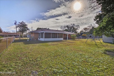 This well-maintained 3-bedroom brick home in Long Beach offers a - photo 32