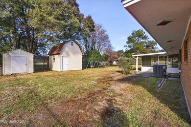 This well-maintained 3-bedroom brick home in Long Beach offers a - photo 33