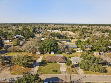 This well-maintained 3-bedroom brick home in Long Beach offers a - photo 35