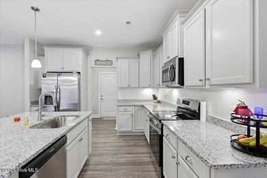 Welcome home! This well-kept two-story home features a bright