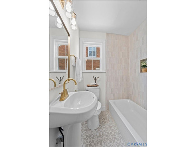 Nestled in the heart of Chimborazo Park, this stunning all-brick - photo 26