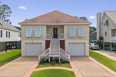 Tucked away on a peaceful waterfront canal in the desirable - photo 4
