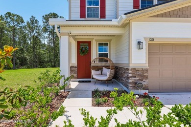 Built in 2024 this beautiful 4 bedroom 2 1/2 bath home sits on - photo 4