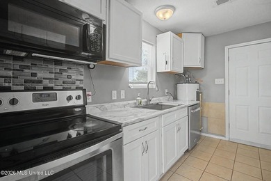Don't miss out on this charming 3-bedroom, 1-bath home located - photo 6
