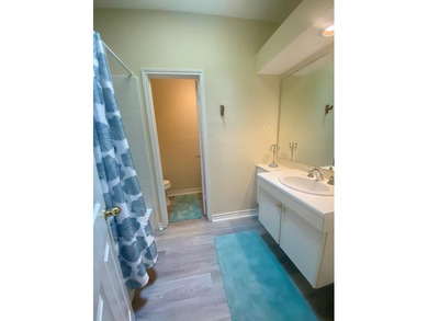 Spacious ground-floor 2-bedroom, 2.5-bath corner unit with a - photo 11