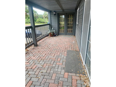 Spacious ground-floor 2-bedroom, 2.5-bath corner unit with a - photo 24