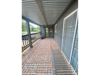 Spacious ground-floor 2-bedroom, 2.5-bath corner unit with a - photo 25