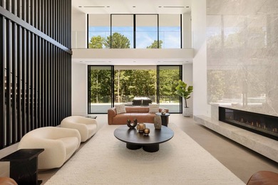 Set amidst lush greenery in one of the Hamptons' most serene - photo 3