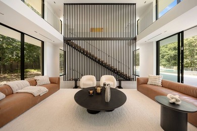 Set amidst lush greenery in one of the Hamptons' most serene - photo 4