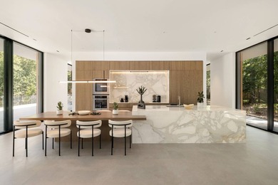 Set amidst lush greenery in one of the Hamptons' most serene - photo 6