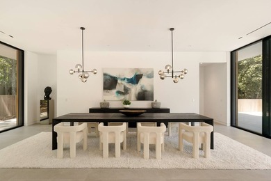 Set amidst lush greenery in one of the Hamptons' most serene - photo 8