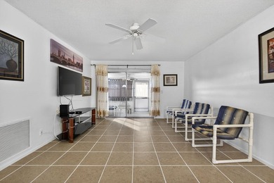 Welcome home to this inviting residence featuring tile floors & - photo 10